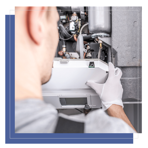 HVAC tech servicing furnace
