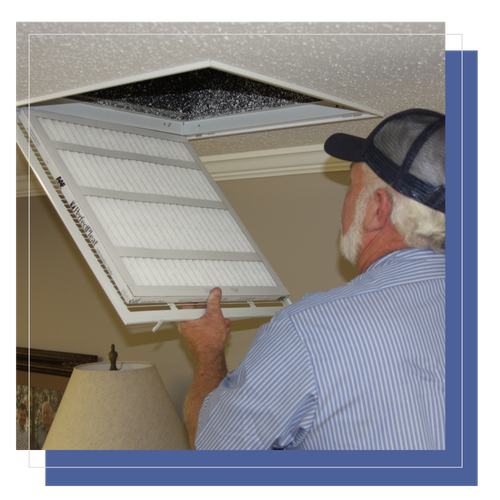 HVAC technician removing vent