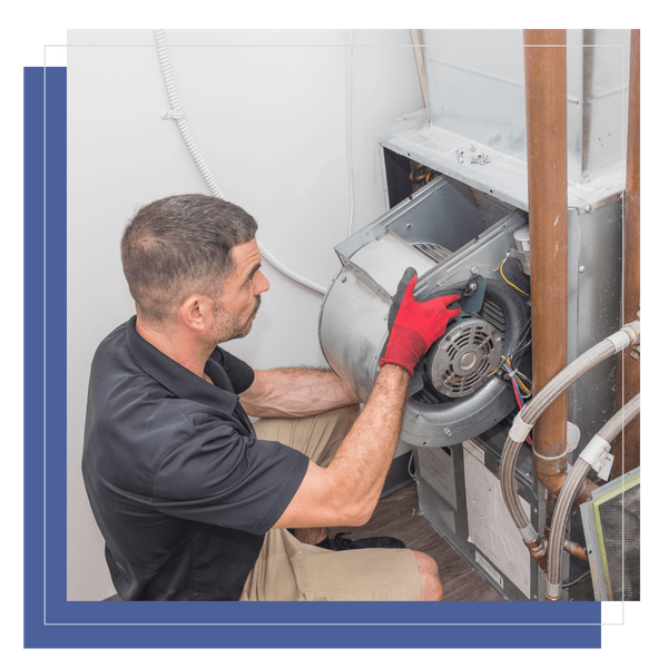 HVAC tech servicing heating pump HVAC tech servicing heating pump