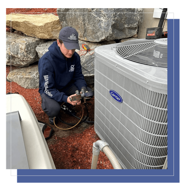 HVAC tech servicing heating pump HVAC tech servicing heating pump
