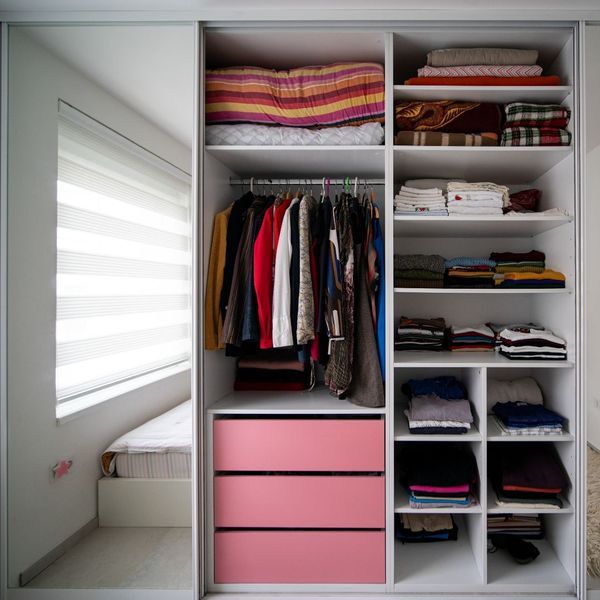 Organized closet in a bedroom. 