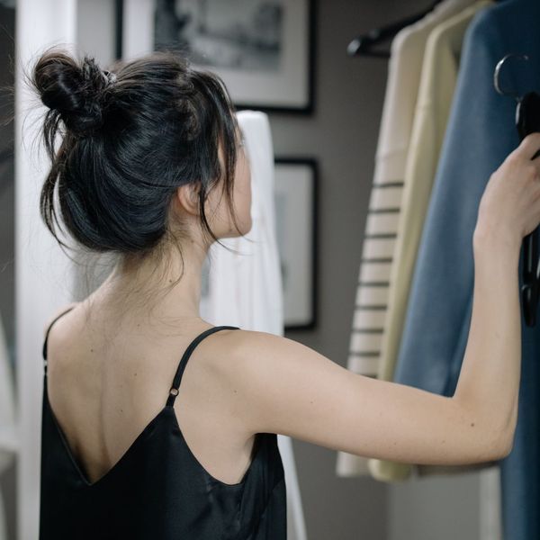 woman looking through clothes