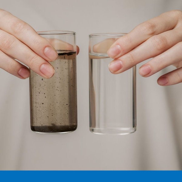 glass with dirty water sediment vs crystal clear water 