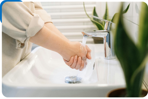 person washing their hands