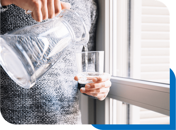 Image of a woman drinking water