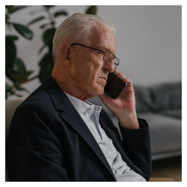 older man on the phone