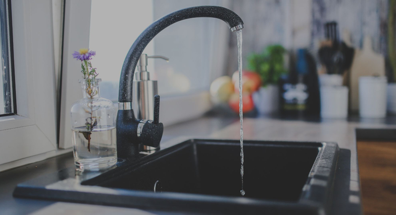 kitchen faucet turned on