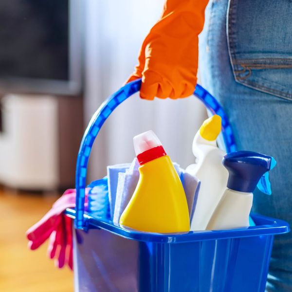 cleaning supplies in a bucket