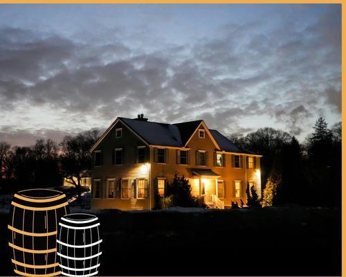 home with lights on at dusk