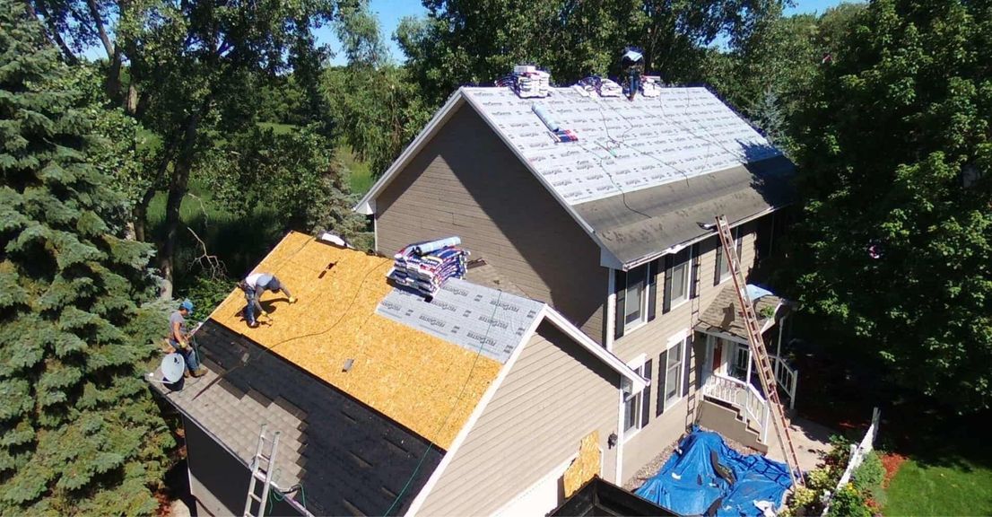 roofer installing a new roof