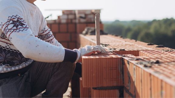 laying bricks