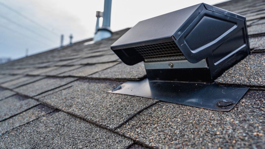 Roof vent installed on shingles for improved attic ventilation