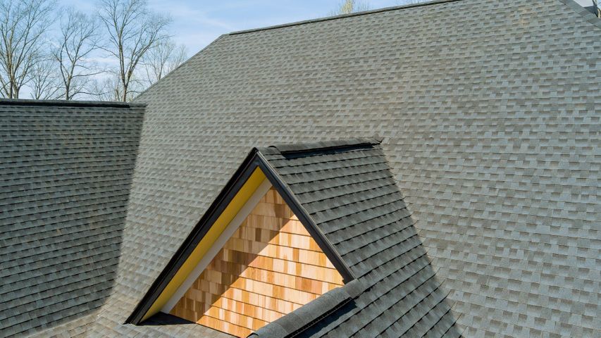 View of a large shingle roof with clean, precise installation