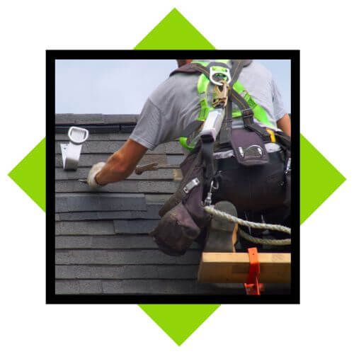 person working on residential roof