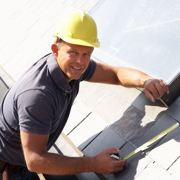 smiling roofing contractor