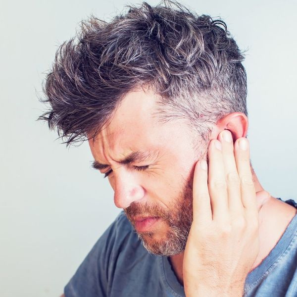 man with ringing in his ears
