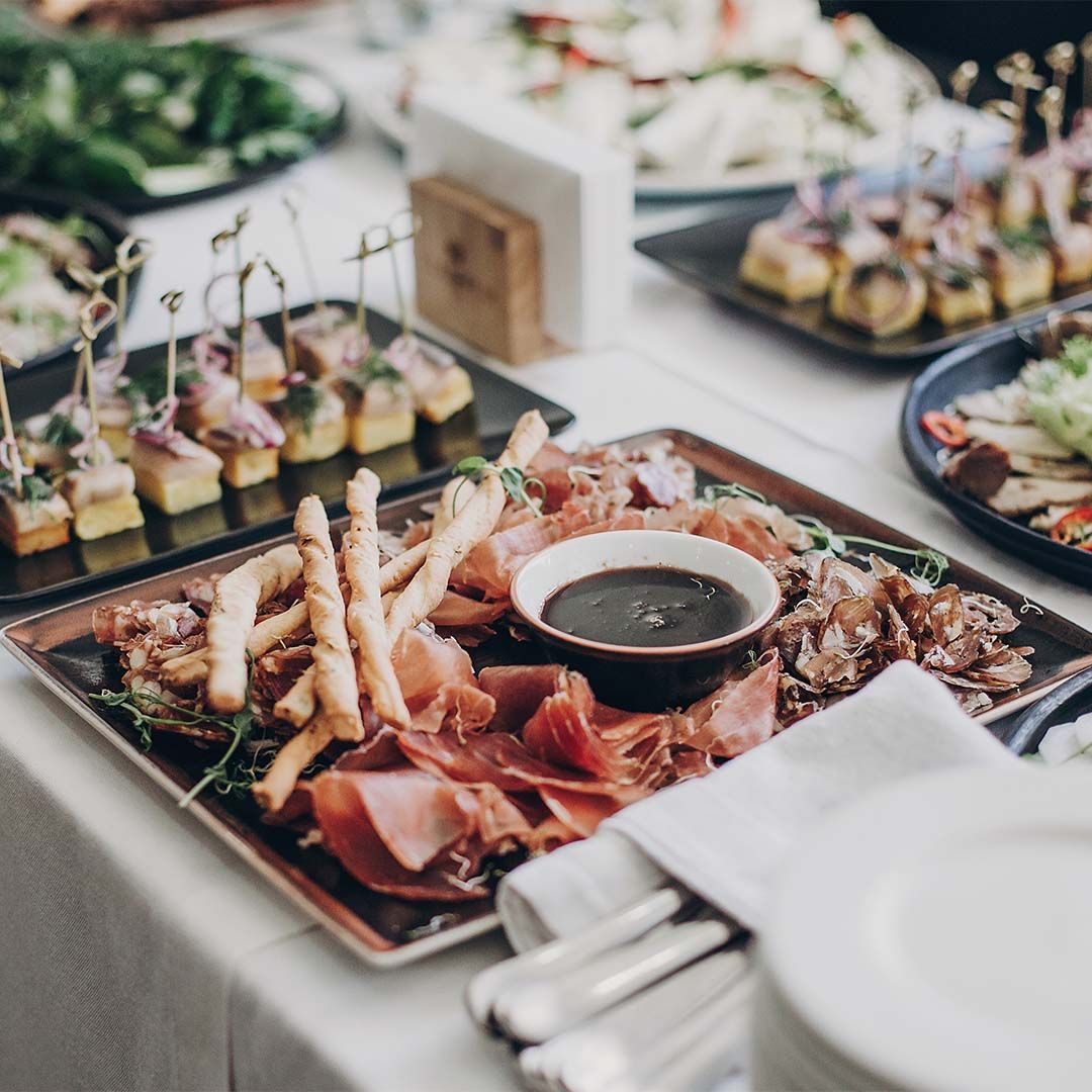 plates of catered food and appetizers