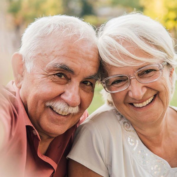 smiling older couple outdoors