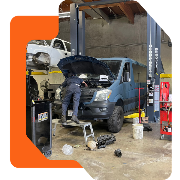 technician working on HVAC van