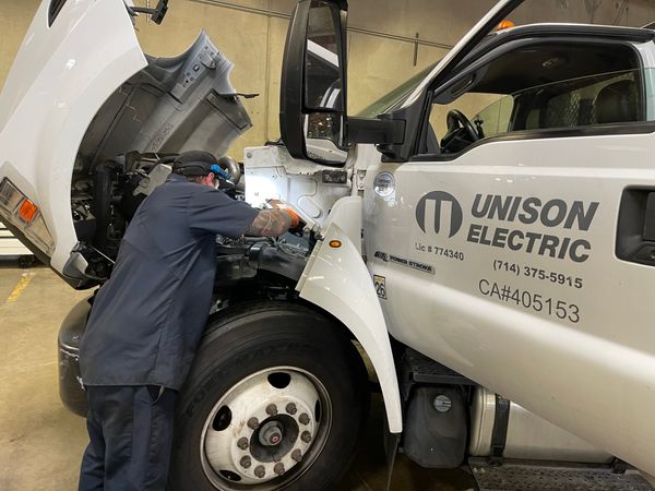 unison electric truck being serviced by Orange County Fleet Repair