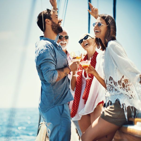 people dancing on a yacht 