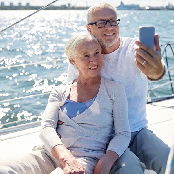 seniors taking a selfie on a boat