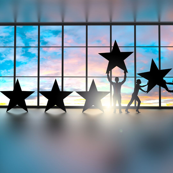 Five stars, people moving stars - representing ratings