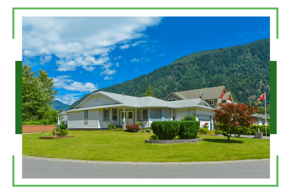 house with perfectly trimmed bushes