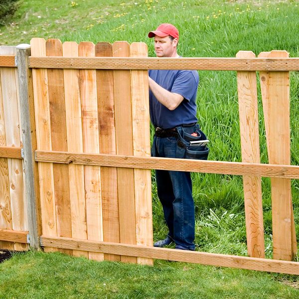 Man installing a fence