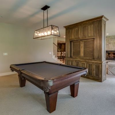 refinished basement with pool table