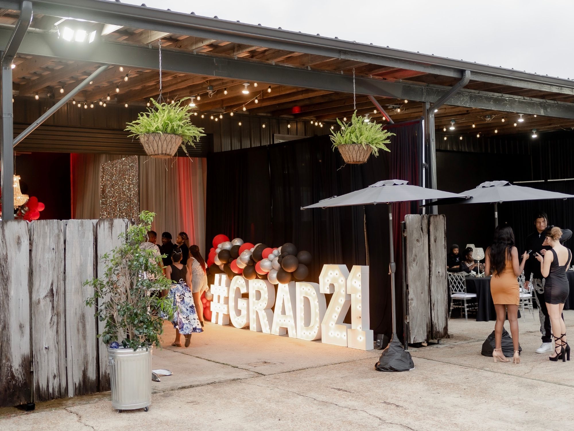 graduation party with balloons and lit up letters graduation party with balloons and lit up letters
