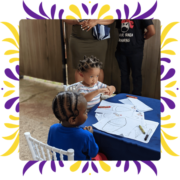 small children coloring at a table small children coloring at a table