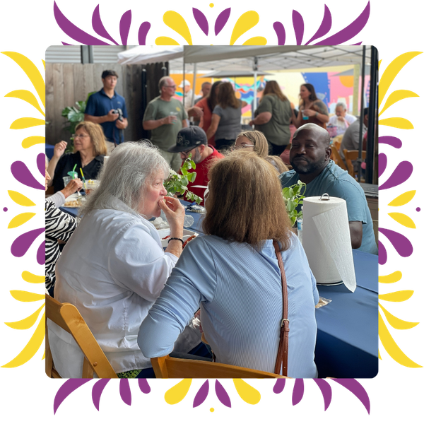 People eating at a work event