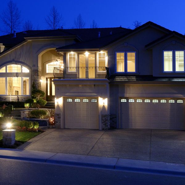 House with 3 car garage at night