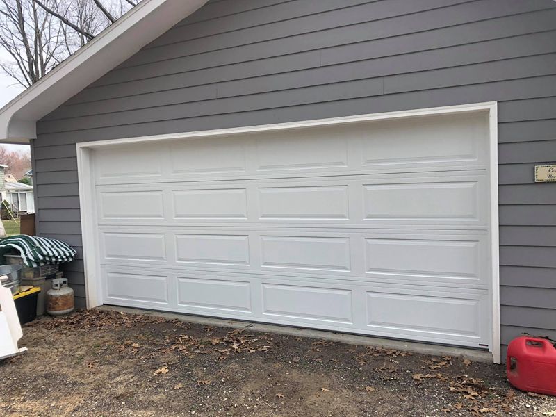 Traditional Long Panel Garage Door 57155312_1101171130085478_6170659237346148352_n.jpg