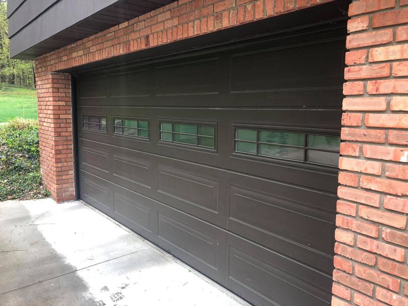 Long Panel Black Garage Door 59229787_1111489029053688_3522152639062081536_n.jpg