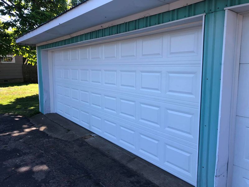 White Short Panel Garage Door 80254428_1453579881511266_8119075061145124160_n.jpg