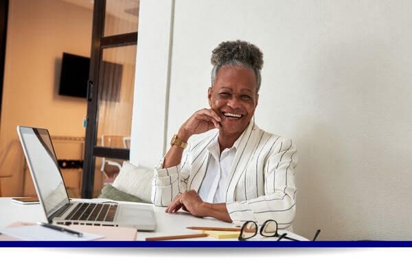 older woman working on a computer