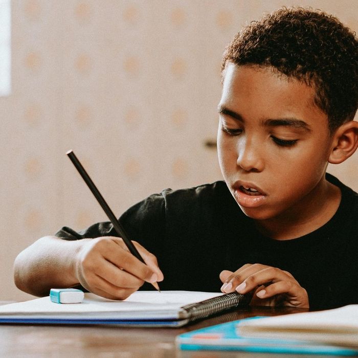 A young student working on homework.