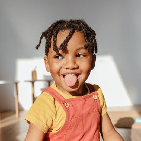 toddler making goofy face