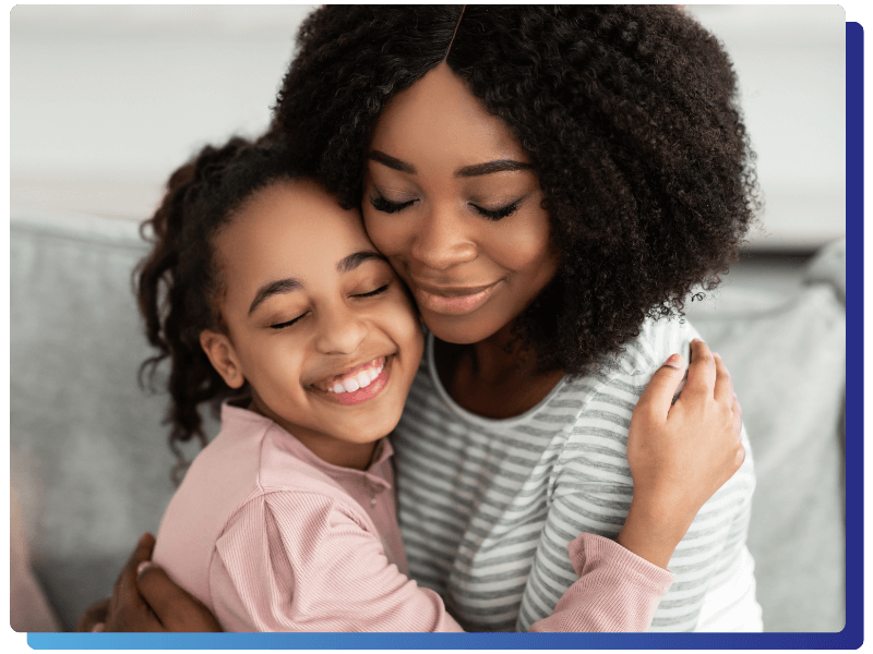 mother and daughter hugging