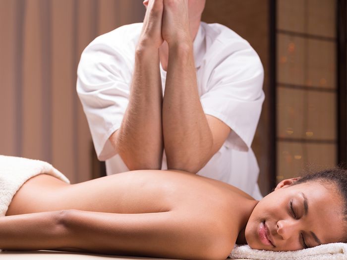 licensed massage therapist providing Swedish massage
