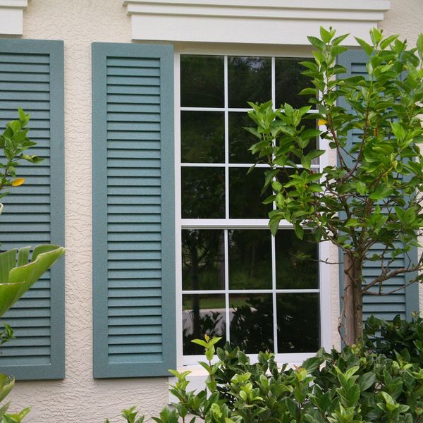 greenish blue exterior plantation shutters