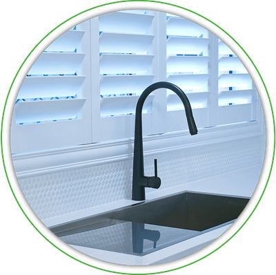 white wood shutters behind sink white wood shutters behind sink