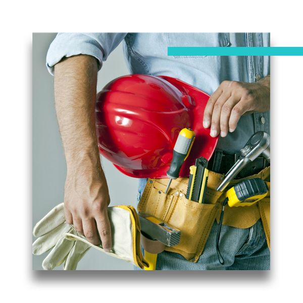 a professional in safety gear with tools
