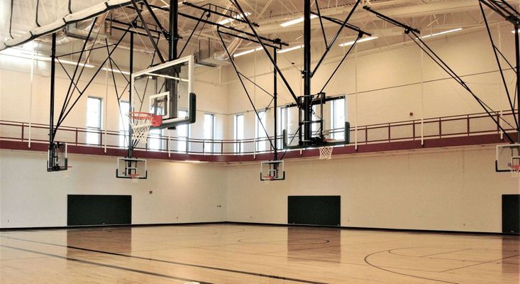 gym with basketball hoops