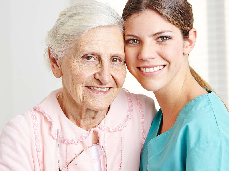 Older woman and a nurse