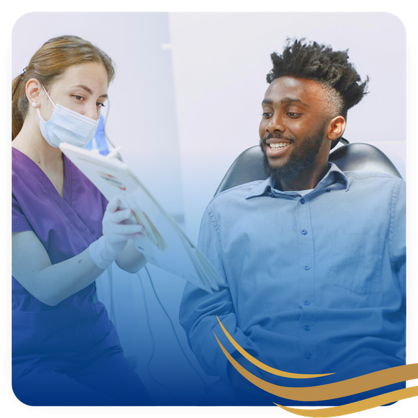 dentist speaking to a patient