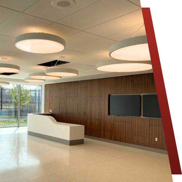 Clean lobby with large lights Clean lobby with large lights
