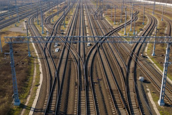 An aerial view of a clean and efficient railroad switchyard.